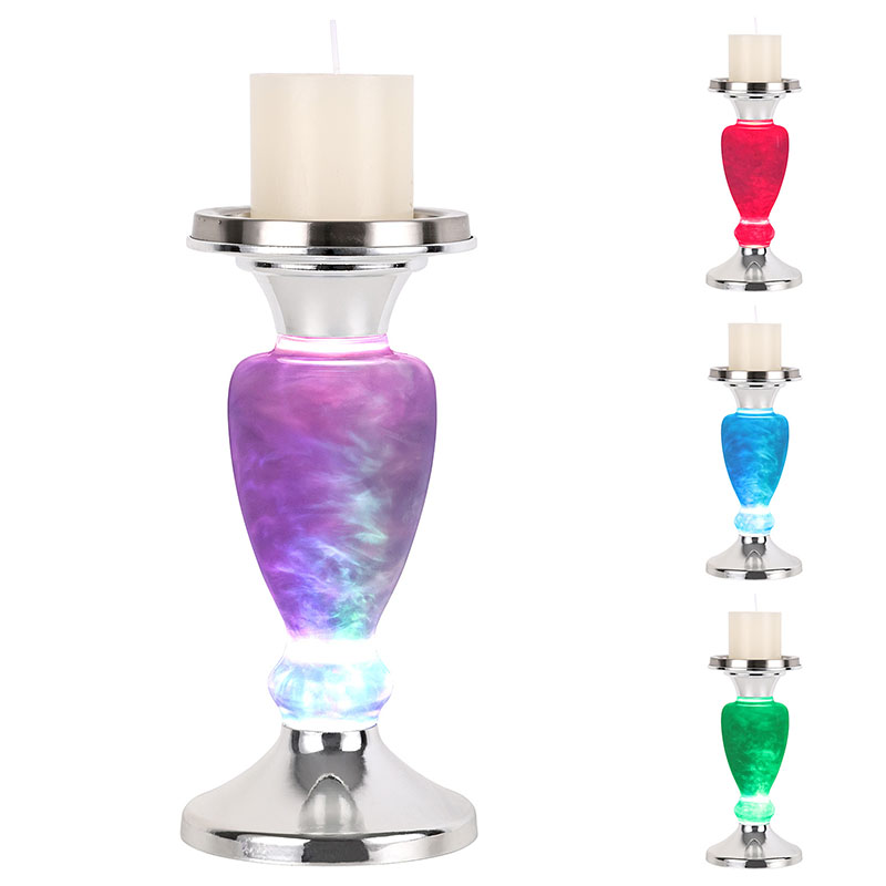 Skyet nattlys med stearinlys